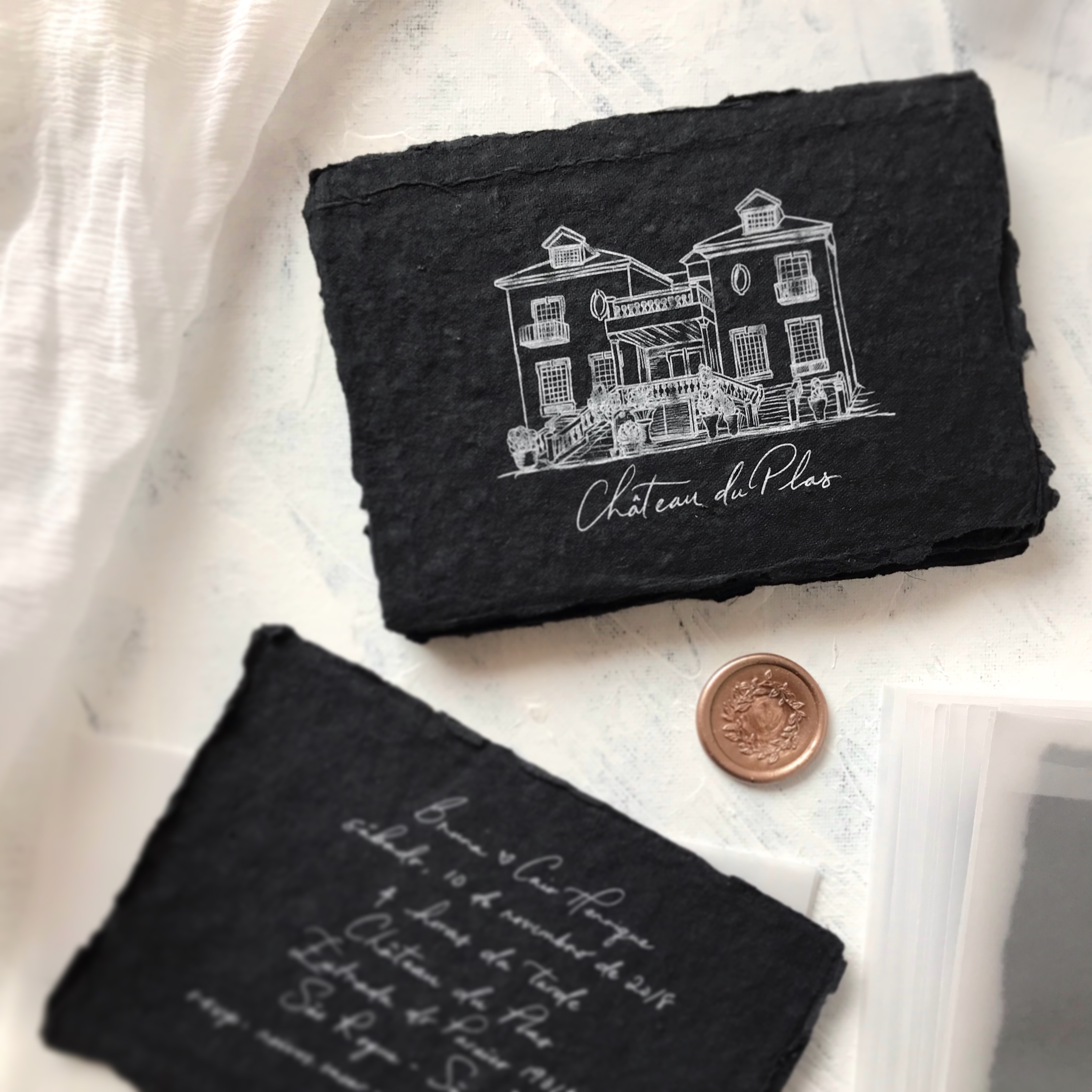 Invitation with hand-drawing of venue & custom wax seal
